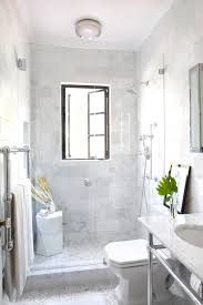Yes The Updated Traditional Trend Isn T Going Anywhere White Marble Bathrooms Window In Shower Marble Bathroom Designs