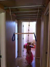 Drill pilot holes through the bottom plate and insert 2 1/2″ screws into the vertical supports to lock everything together tightly. Monkey Bars Indoor Monkey Bars Top Living Room Ideas