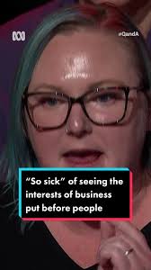 Q+A questioner Amy Brown tells the panel her generation is sick of seeing  the interests of business put before people and asks the panel: When are  politicians going to act