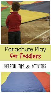 Fun Parachute Games That Keep Toddlers Moving Teaching Toddlers Parachute Games Games For Toddlers
