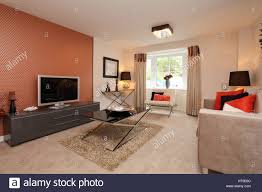 Wohnlandschaft Wohnzimmer Orange Wand Funktion Couchtisch