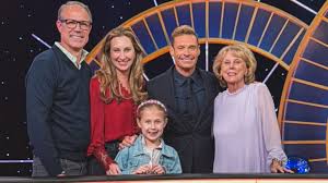 Ryan Seacrest’s Family Visits ‘Wheel of Fortune’ Set for First Time to Meet Vanna White