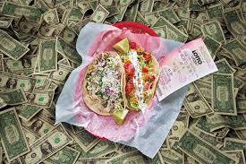 To assemble the tacos, add a bit of the cabbage slaw to a warmed tortilla. Tamiami Tacos Makes A Statement With Million Dollar Tacos