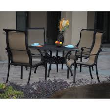 Backyard relaxation isn't complete without a nice patio table. Darlee Monterey Cast Aluminum 5 Piece Round Patio Dining Set Hayneedle