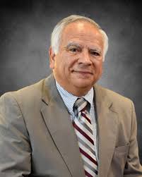 Dr. E. Nelson Escobar