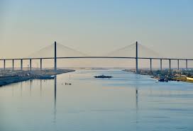 The bridge was built with assistance from the japanese government. The Modern Postcard Travel Blog Sailing The Suez Canal Egypt S Wonder Of A Waterway