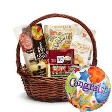 Some of the best engagement gifts are edible ones. Gourmet Congratulations Gift Basket And Balloon At Send Flowers