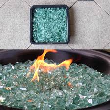 When tempered glass is broken it breaks up into tiny pieces and holds up to the heat very well. Buy Green Fire Glass 10 Pounds Of In Premium Tempered Fire Pit Glass Reflective Fireglass For Fire Pit Fire Table Fireplace Natural Gas And Propane Fire Glass Pellets Rocks High Luster