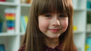 Check out more videos and subscribe: Face Portrait Of Cute Little Girl Looking At The Camera And Smiling Kids Room Background Close Up Video By C Mstockagency Stock Footage 154713280