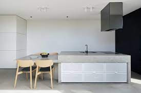 Gone are the days when everyone wanted a sink to look out of the window and in come the sinks integrated into islands that overlook the rest of the room or dining table. Photo 12 Of 14 In An Emerging Architect Turns A Victorian Terrace House Into A Lush Inner City Oasis Dwell