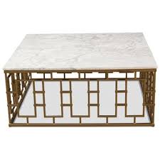 47.5 x 24 x 17.7 inches 2. Monica Hollywood Regency White Marble Gold Iron Square Coffee Table 41 W 50 W Kathy Kuo Home