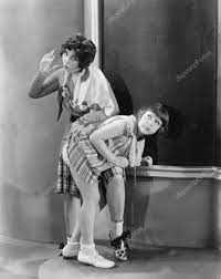 Teacher spanking a girl in a classroom Stock Photo by ©everett225 12296546