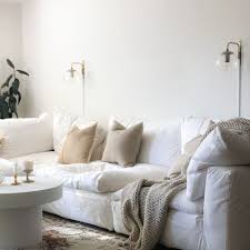 Wyooxoo blue pillow covers 18x18 set of 4 decorative floral throw pillow cover for couch modern outdoor pillows case for sofa living room cushion bed navy blue and white home decor $16.99 $ 16. 20 Beautiful Living Rooms With White Couches