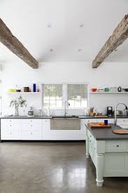 We have so many other room tours for you to check out! The Country Rental A Floating Farmhouse In Upstate New York Remodelista Concrete Kitchen Floor Modern Farmhouse Kitchens Kitchen Flooring