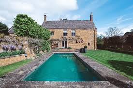The Old Dairy Cotswold Hideaway With A Pool Sand Stone Escapes In 2020 Garden Swimming Pool Pool Pool Houses