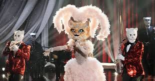 The kitty, whose showgirl glamour is putting all the cats in cats to shame. Clues That Proved Masked Singer Kitty Is Jackie Evancho