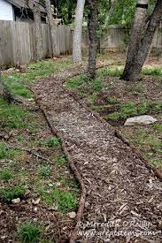 Add a layer of mulch and then flat stepping stones. Mulch Pathway Ideas Google Search Garden Pathways Ideas Garden Pathway Mulch Pathway Ideas