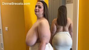 Mia ties up her big boobs. - MatureKingdom.com