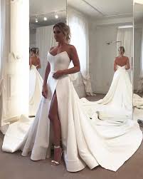 Simple But Elegant Satin Wedding Dresses With Strapless Neckline High Split Design Which Makes Your Satin Bridal Gowns Satin Wedding Gown Simple Bridal Dresses
