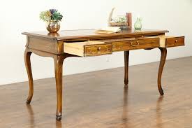 Most have a rectangular or oval shape and substantial feel. Sold Carved Fruitwood Vintage Library Desk Hand Painted Leather Top Drexel 31113 Harp Gallery Antiques Furniture