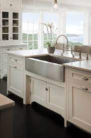This satin white farmhouse sink base cabinet offers the ability to cut out for multiple options. Stainless Steel Farmhouse Style Kitchen Sink Inspiration The Happy Housie