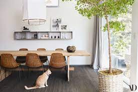 Bronze dining room chandeliers will blend seamlessly with more transitional or rustic décor, while materials like wood or rope will tie together nautical or bohemian themed looks. Our Favorite Dining Room Lighting Ideas Architectural Digest