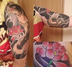 The chrysanthemum, or kiku in japanese, is a symbol that represents longevity and rejuvenation. Traditional Japanese Half Sleeve Namazu Kappa Lotus Flowers And Ocean Waves By Ryu Ichiro At Ryu S Design Custom Tattoo In Fussa Japan Tattoos