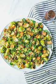 Spicy Roasted Brussels Sprouts With Pancetta Dates And Halloumi Recipe Roasted Brussel Sprouts Spicy Roasted Brussel Sprouts