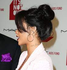 Artist bang bang cut the ink with water to make the tattoo light, the same technique that he used for the rebelle fleur tattoo on her neck. Rihanna Neck Tattoo Rihanna Neck Tattoo Neck Tattoo Rhianna Tattoos