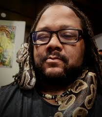 Am I doing something wrong??? The temp and stuff In the terrarium are all  correct according to the standards, but my girl (6 months old) prefers  lately to lay underneath a piece