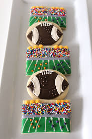 Because it involved these cookies… football cookie pies! Football Decorated Sugar Cookies