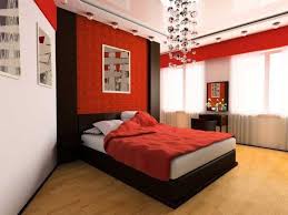 In this bedroom design from petagazine, we can see a glossy white flooring and patterned wallpapers. Homes Red Themed Bedroom Designs Facebook