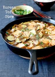 Korean Tofu Stew In Skillet Vegetarian Friendly Recipes Korean Vegetarian Recipes Korean Vegetarian