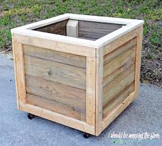 Simply drill holes in the bottoms for drainage. How To Make A Rolling Planter Box I Should Be Mopping The Floor