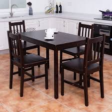Amazon Com Md Group Dining Chairs Amp Table Set Solid Brown Pine Wood Home Kitchen Round Wood Dining Table Dining Table Setting Pedestal Dining Room Table