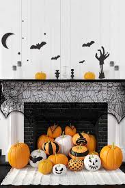 31 Amazon Halloween Decorations You Can Get Last Minute Hauntingly Chic Halloween Room Decor Halloween Wall Decor Halloween Fireplace