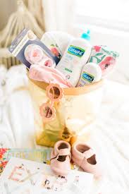 Mostly, guests give presents not just for the future baby, but for moms too. How To Put Together The Cutest Diy Baby Shower Gift Basket Glitter Inc