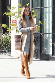 If you are seeking a slightly dressier casual look, try a canadian tuxedo jacket with a camel coat and high heeled thigh high boots. Over The Knee Boots The Budget Babe Affordable Fashion Style Blog