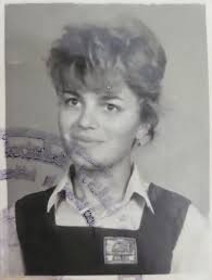 A colourised photo by H Cooper railway road of a proud Mother with her four  children..don't think he did colour photography then..wonder what he'd  think..my mother with brother and sisters...40s