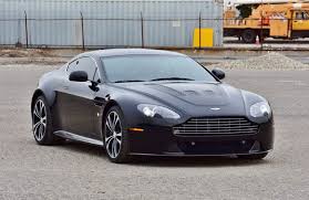 Image result for Onyx Black 2011 Aston Martin