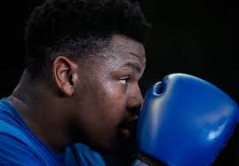 MPD Lt. John Mackey leads youth boxing club