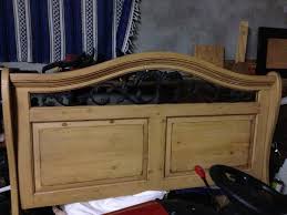 Simple men's headboard with white antlers accent. Wood And Wrought Iron Headboards Ideas On Foter