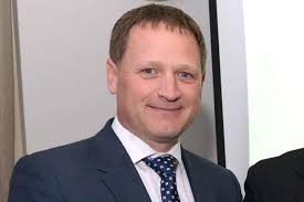 National director admits 'misconduct' in prior trust CEO role