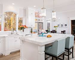 White kitchen cabinets remain massively popular among home remodelers, and rightfully so. Small Painted White Traditional Kitchen Crystal Cabinets
