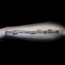 White ink music word tattoo. 75 Music Note Tattoos For Men Auditory Ink Design Ideas