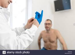 Then washing your hands with sterilizers before conducting the self prostate massage procedure is essential. Doktor Urologe Stellt Eine Medizinische Handschuh Auf Den Arm Prostata Des Patienten Zu Untersuchen Prostata Massage Lymphdrainage Stockfotografie Alamy