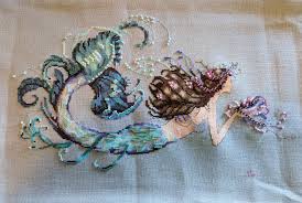 18 x 22 inches on 14 count aida, navy blue 107 dmc thread colours 24 pattern pages, black & coloured symbols (chart sample shown the most beautiful mermaid pattern i have seen. Fo Mermaid Undine By Mirabilia Crossstitch