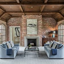 A fireplace, some plants and fur would make your living room cozy, and of course, a stone or brick wall! 75 Beautiful Brick Wall Living Room Pictures Ideas April 2021 Houzz