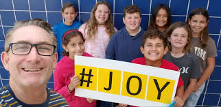 Malcom fifth-grade teacher honored for 'giving joy'