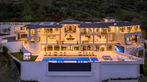 Ever wanted a really big, really gaudy house? 10697 Somma Way Brand New Mega Mansion Hits Market For 100 Million